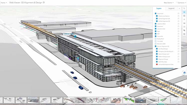 Modèle 3D d’un grand bâtiment avec des voies ferrées intégrées et des infrastructures environnantes