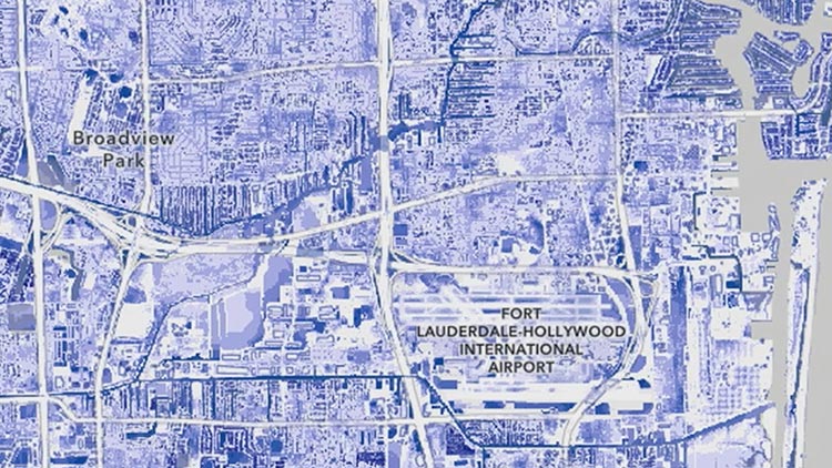 Carte aux tons bleus montrant la disposition détaillée des rues et les infrastructures, incluant les étiquettes de Broadview Park et de l’aéroport international Fort Lauderdale-Hollywood, avec un bouton de lecture en superposition