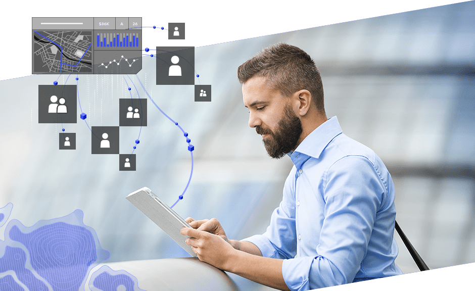 Jeune professionnel travaillant sur une tablette, icônes de personnes connectées par une ligne et graphique avec une carte et un diagramme à barres