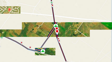Image aérienne d’un espace vert avec des lignes et des symboles représentant des données d’itinéraire de pipeline