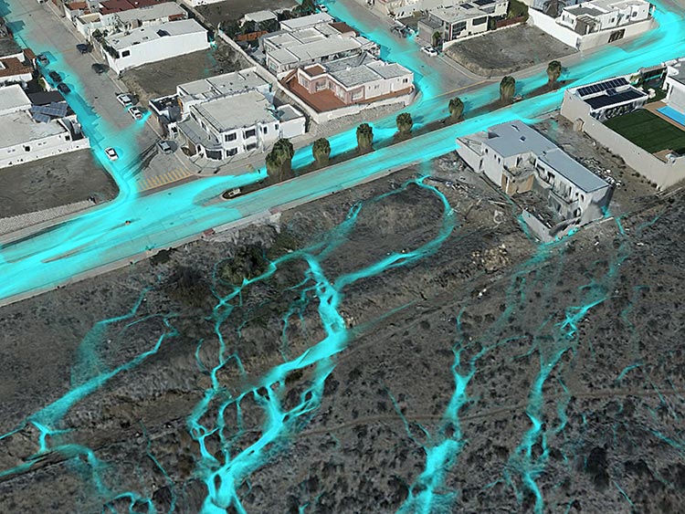 L’ombrage bleu indique les fonctionnalités de science des données dans ArcGIS Pro qui sont utilisées pour exécuter une simulation d’inondation autour des bâtiments et de la végétation