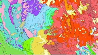 Illustration multicolore d’une carte avec des régions en rouge, en bleu et en violet