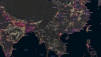 Carte numérique noire représentant les continents et océans avec des régions mises en évidence en rose et en jaune
