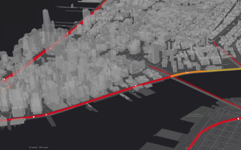 GIF montrant des voitures conduisant à travers des autoroutes aux bâtiments 3D à New York.