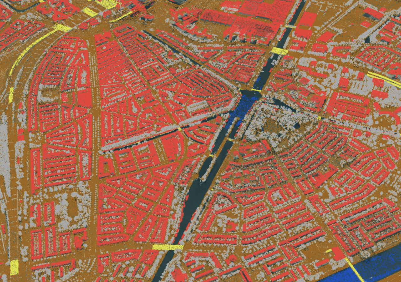 Vue aérienne d’une carte d’une ville avec des bâtiments rouge vif et des routes marrons