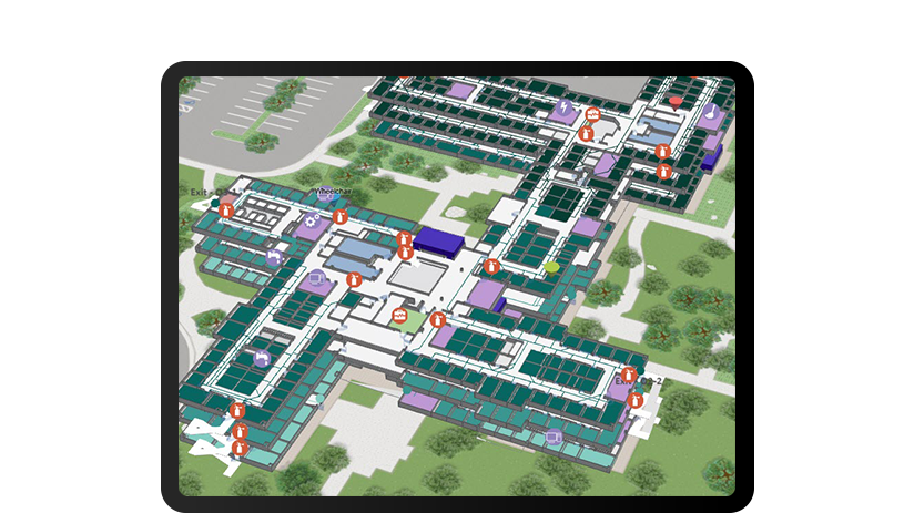Tablette affichant une collecte de données indoor avec la localisation des ressources sur une carte d’un grand bâtiment de bureaux et des points de données rouges
