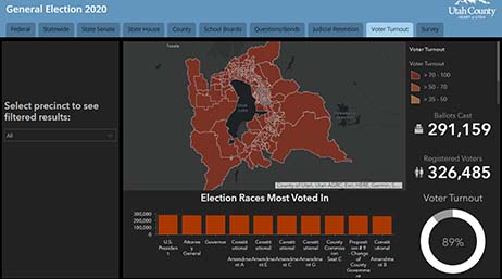 Tableau de bord cartographique avec une carte et des statistiques en orange et blanc sur fond noir