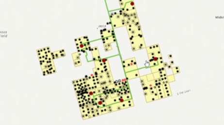 Carte de bâtiments en jaune et vert avec des points cartographiques noirs éparpillés