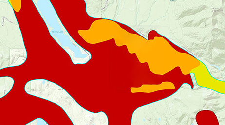 Carte d’isolignes comportant des zones ombrées en rouge et en orange sur un arrière-plan beige