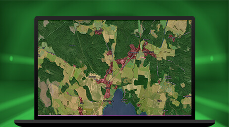 Image d’un ordinateur portable affichant la carte d’une zone forestière en vert clair et vert foncé