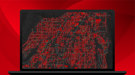 Ordinateur portable affichant des zones en surbrillance sur une carte 3D illustrant ArcGIS Field Maps