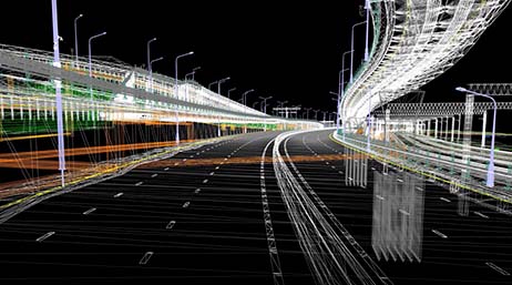 Photo d’une autoroute de nuit avec les ponts imposés numériquement et les routes représentant les infrastructures